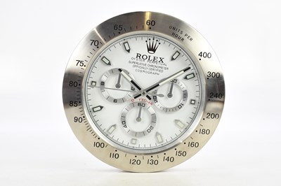 Lot 615 - AFTER ROLEX; a decorative quartz wall clock,...