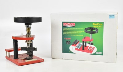 Lot 621 - HOROTEC; a boxed watch opener, with equipment.