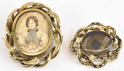 Lot 1373 - Two gold plated mourning brooches, the smaller...
