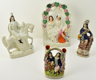Lot 580 - Four items of 19th century Staffordshire...