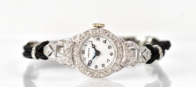 Lot 899 - VERTEX; a platinum Art Deco style cocktail...
