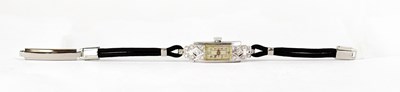 Lot 884 - An Art Deco style platinum cocktail watch, the...