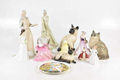 Lot 1492 - BESWICK; three models of cats, and an...