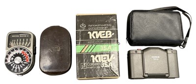Lot 324 - A boxed Kiev-35A camera, in original leather...