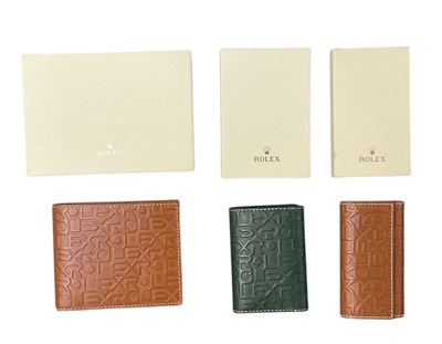 Lot 475 - ROLEX; a boxed tan leather wallet, 9.5 x...