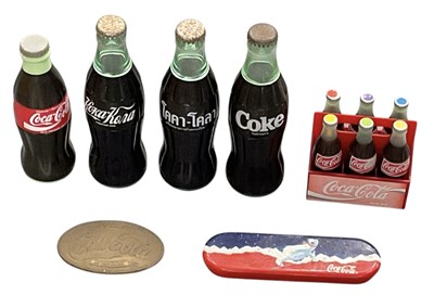 Lot 376 - COCA-COLA INTEREST; four Coca-Cola bottle...