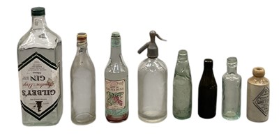 Lot 370 - Eight vintage glass bottles including large...