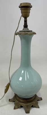 Lot 352 - A Chinese very pale glass celadon glazed...