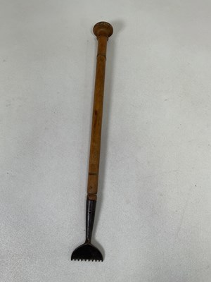 Lot 41 - An early 20th century carpet edging tool, with...