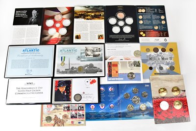Lot 599 - A collection of commemorative coin packs to...
