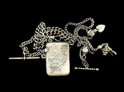 Lot 1271 - A graduated silver Albert chain with T-bar and...