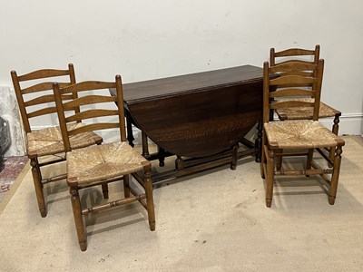 Lot 1043 - A 19th century oak drop-leaf gateleg dining...