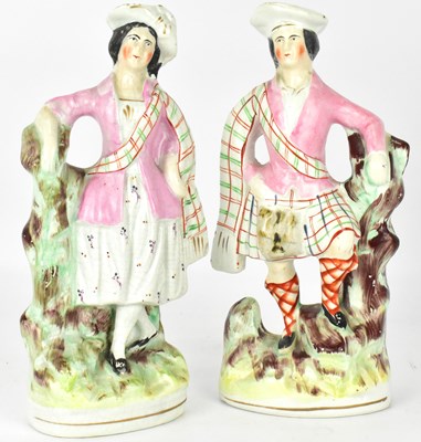 Lot 440 - Two 19th century Staffordshire pottery figures...