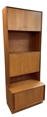 Lot 64 - G PLAN; a teak mid century narrow wall unit,...