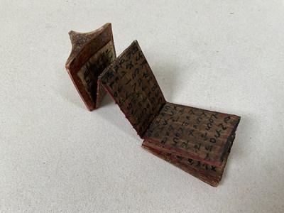 Lot 17 - An unusual Sumatran folding book, set with...