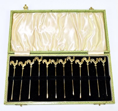 Lot 2416 - A cased set of twelve sterling silver gilt...