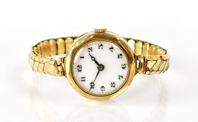 Lot 888 - A 9ct gold lady's wristwatch, the circular...