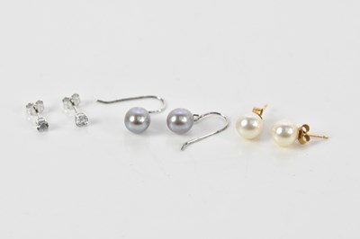 Lot 307 - Two pairs of simulated pearl earrings and a...