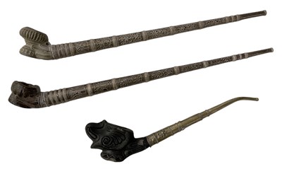 Lot 351 - A pair of white metal clad Eastern style opium...