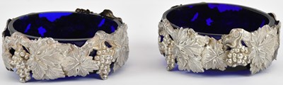 Lot 1214 - A pair of white metal blue glass lined open...