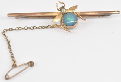Lot 1367 - A yellow metal opal and seed pearl set bar...