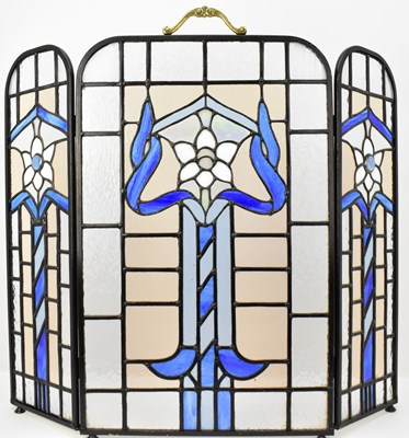Lot 97 - A modern two fold, three section stained glass...