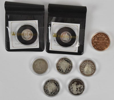 Lot 1595 - JUBILEE MINT; two encapsulated Platinum...