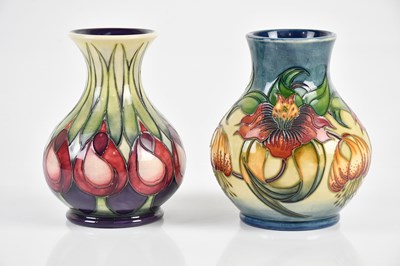 Lot 781 - MOORCROFT; two baluster shaped vases including...
