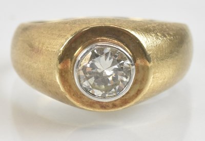 Lot 1232 - A 9ct gold solitaire ring, with single bezel...