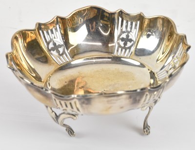 Lot 1200 - A George V hallmarked silver circular pierced...
