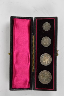Lot 1546 - A cased 1888 Maundy coin set including...