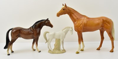 Lot 598 - BESWICK; a large palomino horse figure, height...
