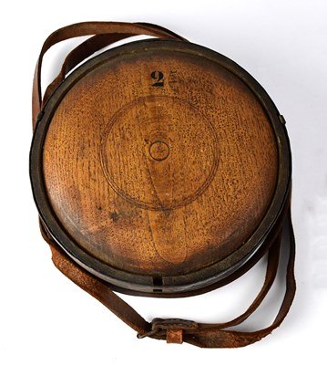 Lot 545 - A wooden metal bound water canteen with tan...