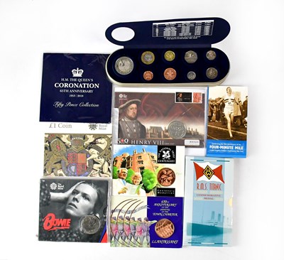 Lot 666 - Nine commemorative coin packs, comprising 2000...