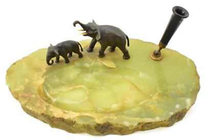 Lot 360 - An Art Deco period green onyx desk tidy with...
