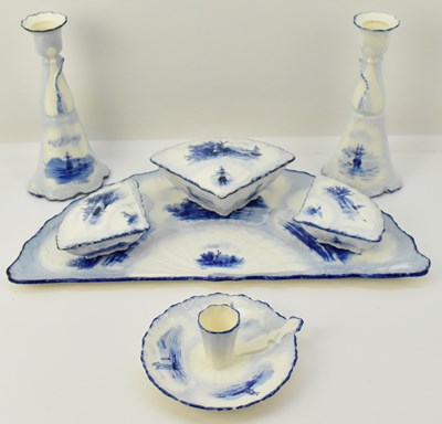 Lot 564 - A seven piece Continental porcelain dressing...