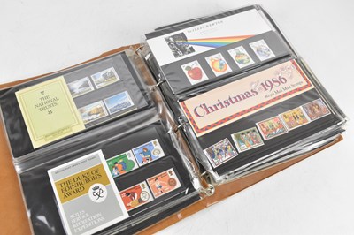 Lot 341 - GREAT BRITAIN, presentation packs in an album...