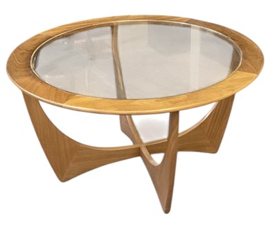 Lot 69 - A teak mid century glass topped 'Astro' type...
