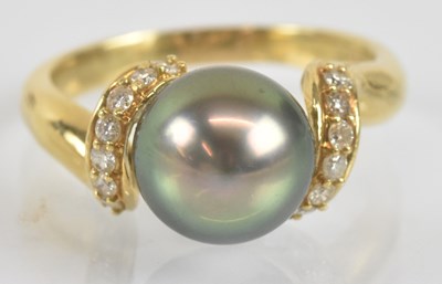 Lot 1236 - An 18ct gold black Tahitian pearl ring, with...