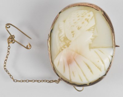 Lot 1375 - A cameo brooch with carved shell depicting...
