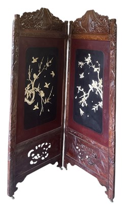 Lot 70 - A modern Chinese carved hardwood two-section...