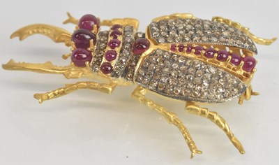 Lot 1356 - A 925 hallmarked silver gilt brooch modelled...
