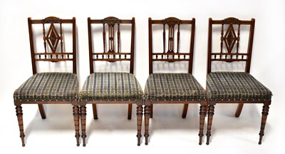 Lot 64 - A set of four Edwardian spindle back dining...
