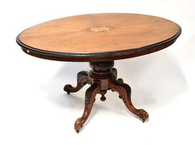 Lot 70 - A 19th century inlaid and ebonised loo table...
