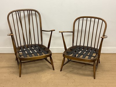 Lot 580 - ERCOL; two armchairs, height 87cm, together...