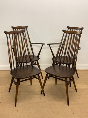 Lot 585 - ERCOL; four stick back dining chairs,...