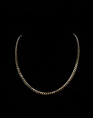 Lot 1208 - A 9ct yellow gold flat curb link chain, approx...