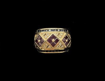 Lot 1212 - A 9ct yellow gold diamond, ruby and sapphire...