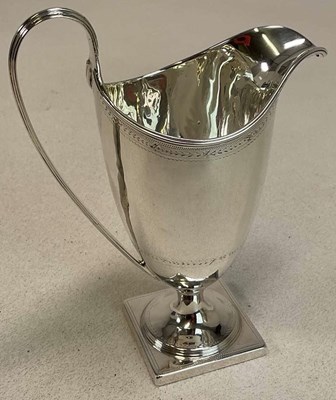 Lot 1081 - A George III hallmarked silver helmet shaped...