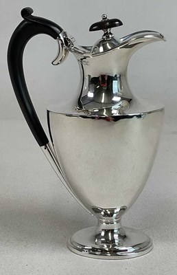 Lot 1046 - A late Victorian hallmarked silver hot water...